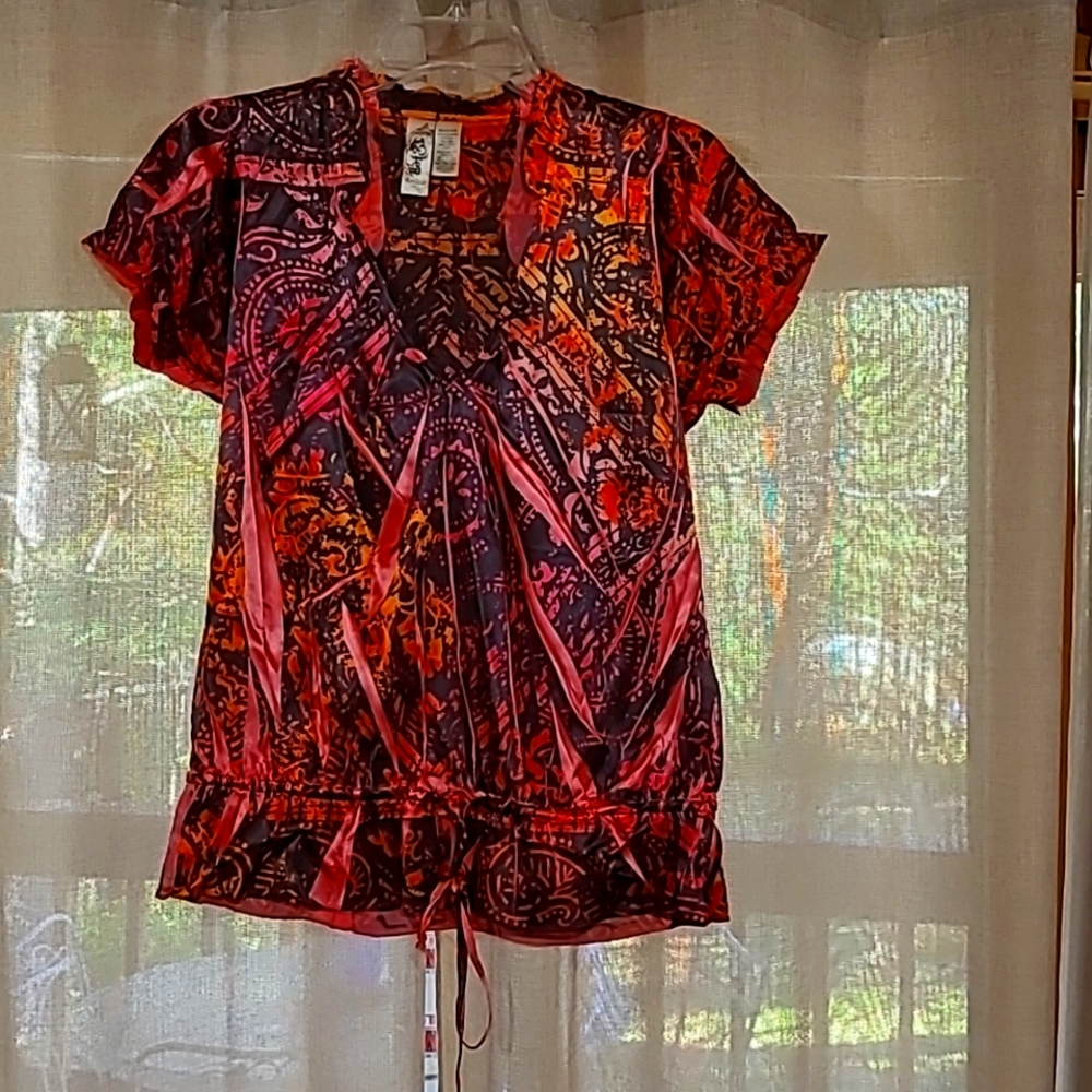 Silky textured poly top.